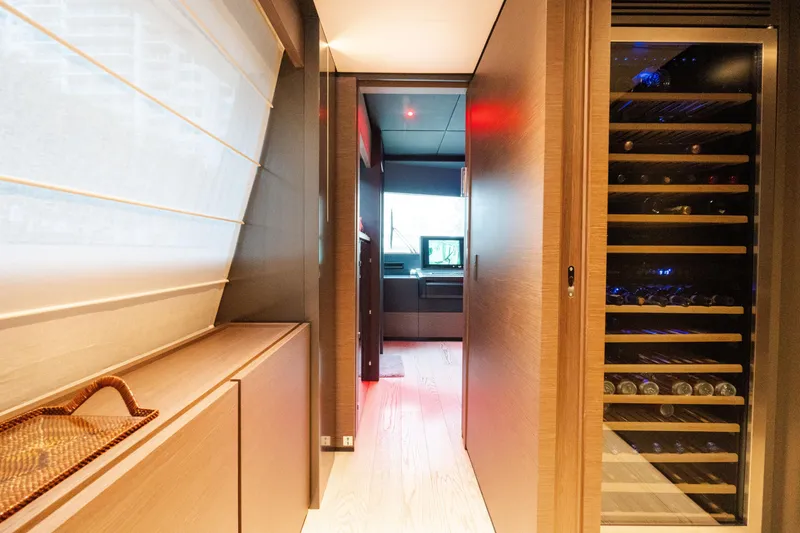 Slide: The Image of Luxurious interior of 2018 Custom Line Navetta 33 yacht with wine storage. - 59