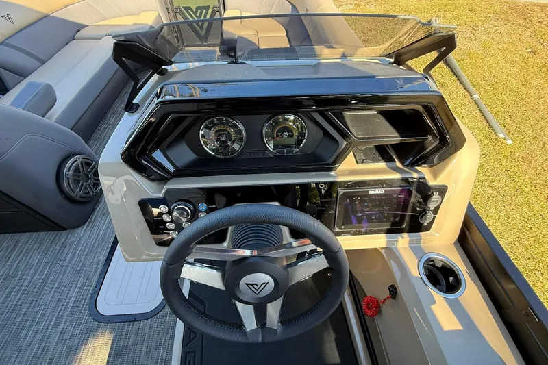 Slide: The Image of 2026 Viaggio Lago Z-B boat dashboard with steering wheel and control panel. - 15