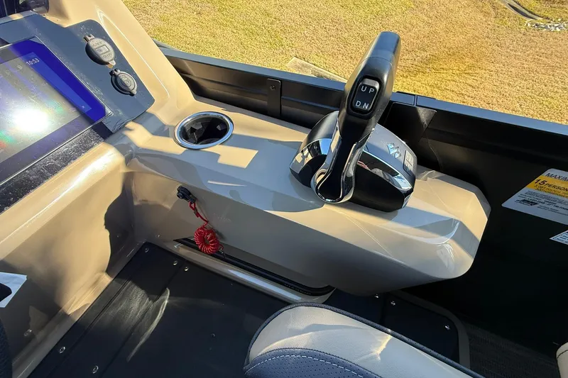 Slide: The Image of Control panel of 2026 Viaggio Lago Z-B boat with throttle and display screen. - 18