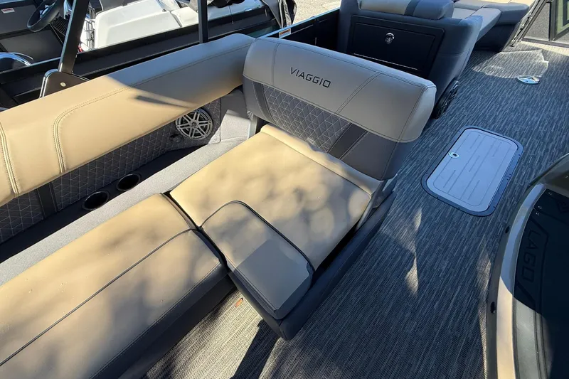 Slide: The Image of 2026 Viaggio Lago Z-B boat interior with beige seating and modern design. - 28