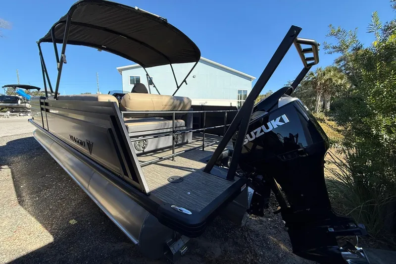 Slide: The Image of 2026 Viaggio Lago Z-B pontoon boat with Suzuki engine, parked outdoors. - 5