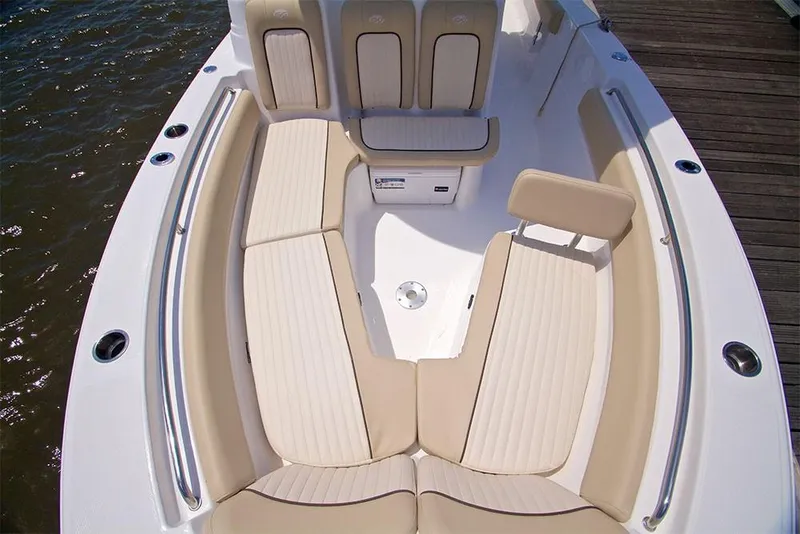 Slide: The Image of Manufacturer Provided Image: 2019 Sea Fox 249 Avenger boat with beige cushioned seating in the bow area. - 4