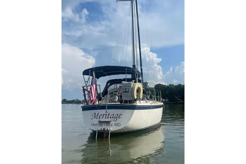 Slide: The Image of 1982 O'Day 34 sailboat named "Meritage" docked in Herring Bay, Maryland. - 11