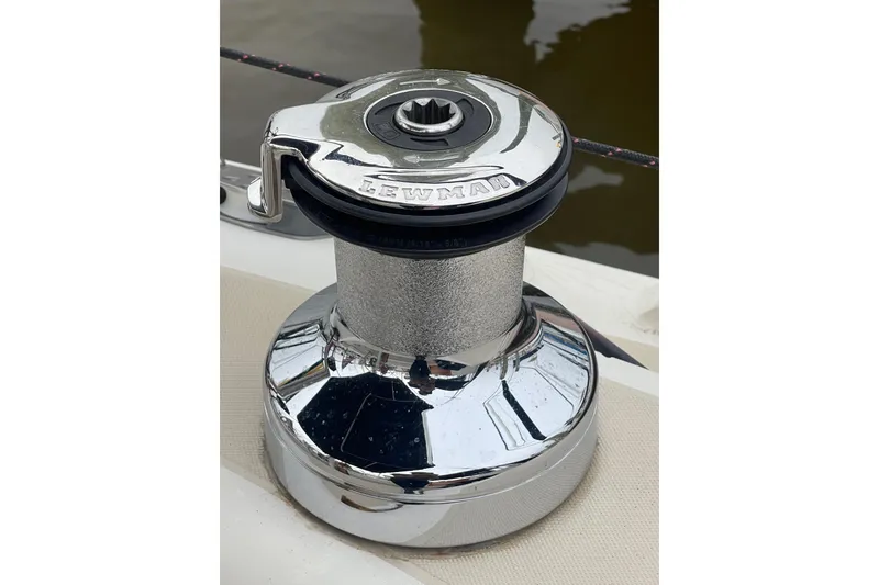 Slide: The Image of Chrome winch on 1982 O'Day 34 sailboat, featuring Lewmar branding. - 20