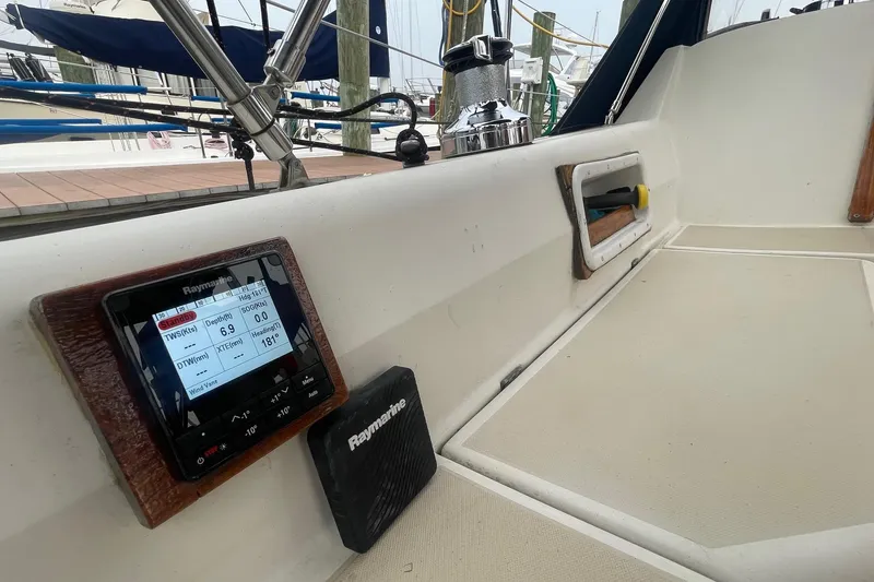 Slide: The Image of Cockpit of 1982 O'Day 34 sailboat with Raymarine navigation display. - 23