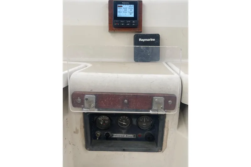 Slide: The Image of Control panel of a 1982 O'Day 34 sailboat with Raymarine display. - 24