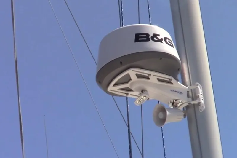 Slide: The Image of Radar equipment on 1982 O'Day 34 sailboat mast against clear blue sky. - 25