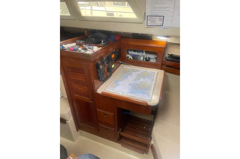 Slide: The Image of Interior of 1982 O'Day 34 sailboat with navigation table and equipment. - 39