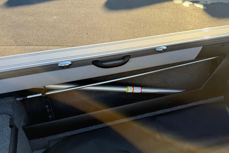 Slide: The Image of Storage compartment of 2026 Crestliner 1850 Super Hawk boat, featuring sleek design and durable materials. - 20