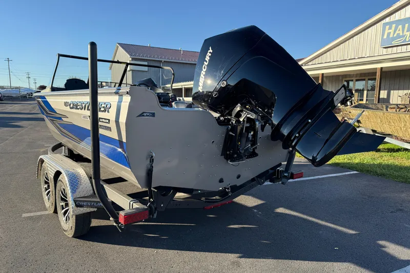 Slide: The Image of 2026 Crestliner 1850 Super Hawk boat with Mercury outboard motor on a trailer. - 4