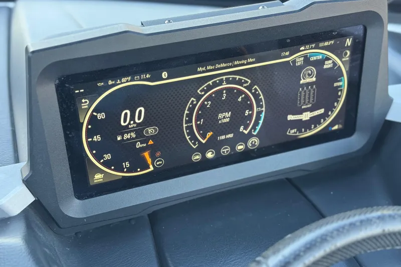 Slide: The Image of 2023 Malibu Wakesetter 21 LX dashboard display showing speed, RPM, and surf settings. - 29