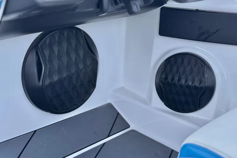 Slide: The Image of 2023 Malibu Wakesetter 21 LX interior speakers with sleek black grille design. - 34