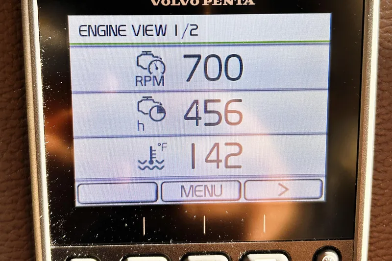 Slide: The Image of Volvo Penta engine display showing RPM, hours, and temperature on Ranger Tugs R-29 CB, 2019. - 32