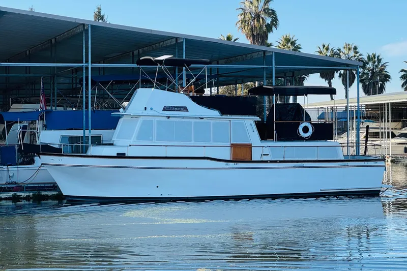 The Image of 1978 Californian 42 LRC yacht docked at marina with palm trees in background. - 0