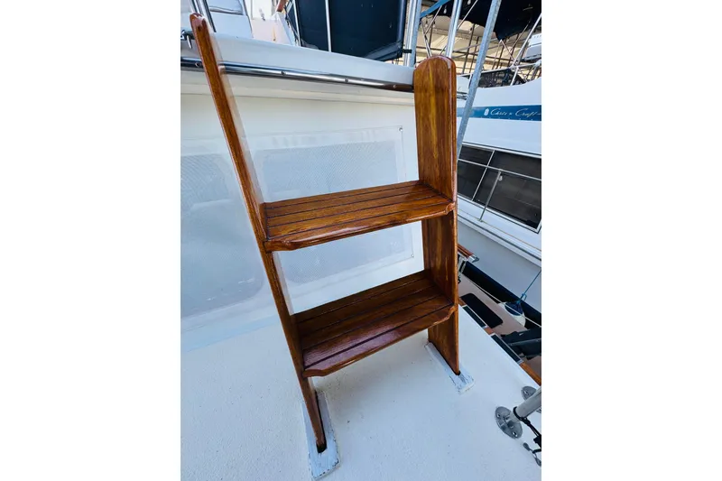 Slide: The Image of Wooden ladder on 1978 Californian 42 LRC boat deck, showcasing craftsmanship and design. - 21