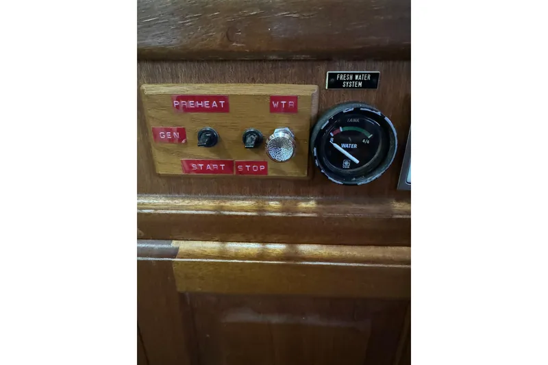Slide: The Image of Control panel of 1978 Californian 42 LRC boat with water gauge and switches. - 55