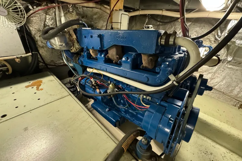 Slide: The Image of Blue engine in a 1978 Californian 42 LRC boat, detailed view in engine room. - 57
