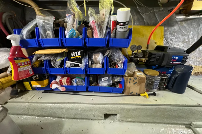 Slide: The Image of Organized storage of tools and supplies in a 1978 Californian 42 LRC engine room. - 62