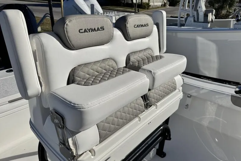 Slide: The Image of 2026 Caymas 281 HB boat seating with quilted upholstery and armrests. - 19