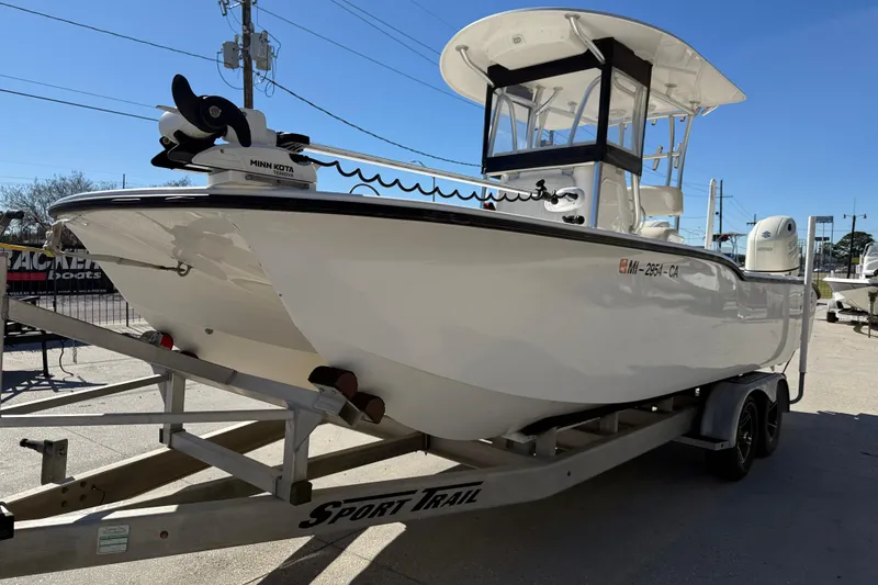 Slide: The Image of 2020 Tideline 235 Hybrid boat on trailer, featuring Minn Kota trolling motor. - 4