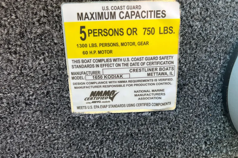 Slide: The Image of US Coast Guard capacity label for Crestliner 1650 Hawk, 2026 model, 5 persons or 750 lbs. - 16
