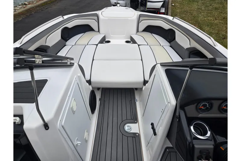 Slide: The Image of 2017 Yamaha Boats 212 Limited S interior with sleek seating and modern dashboard. - 12