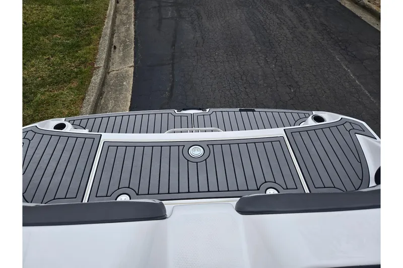 Slide: The Image of 2017 Yamaha Boats 212 Limited S swim platform with sleek gray decking. - 25
