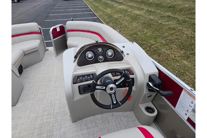 Slide: The Image of 2008 Berkshire CPT 24 RFX boat interior with steering wheel and dashboard controls. - 18