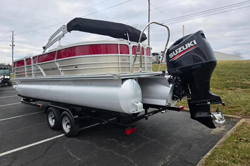 Slide: The Image of 2008 Berkshire CPT 24 RFX pontoon boat with Suzuki outboard motor on trailer. - 3