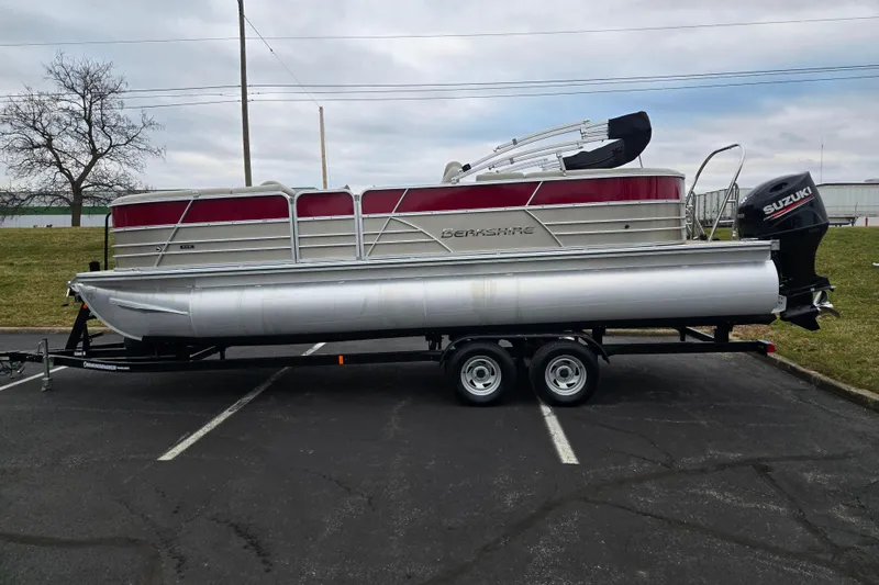 Slide: The Image of 2008 Berkshire CPT 24 RFX pontoon boat on trailer with Suzuki outboard motor. - 4