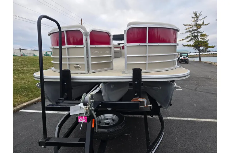 Slide: The Image of 2008 Berkshire CPT 24 RFX pontoon boat on trailer, parked near a waterfront. - 6
