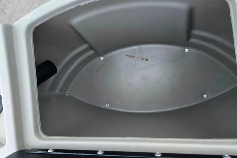 Slide: The Image of Storage compartment of a 2020 Sun Tracker Bass Buggy 18 DLX boat. - 26