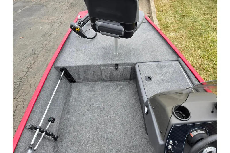 Slide: The Image of 2024 Tracker Bass Tracker Classic XL boat interior with seating and control panel. - 14