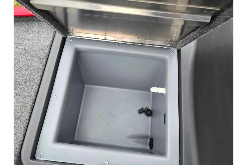 Slide: The Image of Open storage compartment in 2024 Tracker Bass Tracker Classic XL boat. - 15