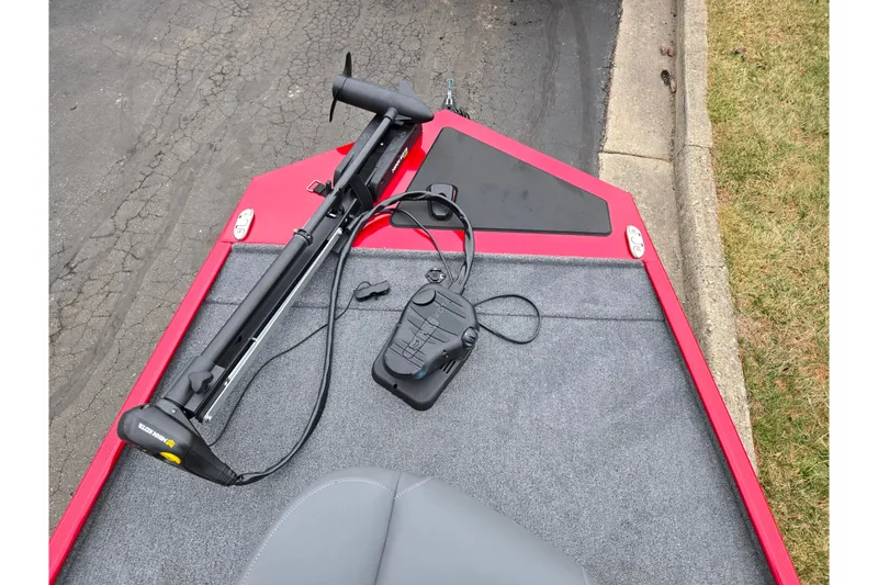 Slide: The Image of 2024 Tracker Bass Tracker Classic XL boat with trolling motor and foot pedal on deck. - 17