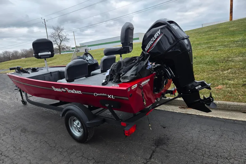 Slide: The Image of 2024 Tracker Bass Tracker Classic XL boat with Mercury engine on trailer. - 3