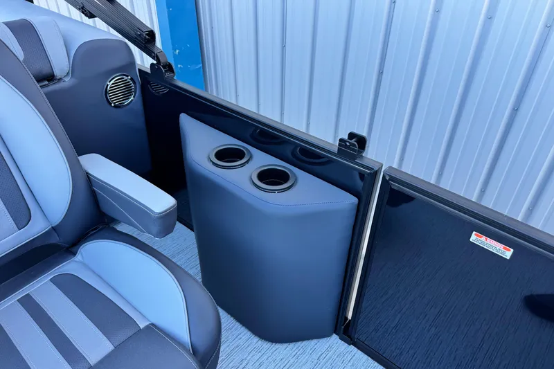 Slide: The Image of 2026 Bennington 22 SSR boat interior with cup holders and seating detail. - 11