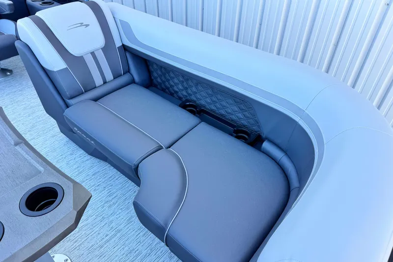 Slide: The Image of 2026 Bennington 22 SSR boat interior with luxurious seating and cup holders. - 18
