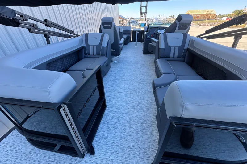 Slide: The Image of 2026 Bennington 22 SSR pontoon boat interior with luxurious seating and modern design. - 8