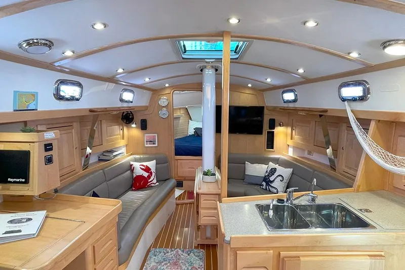 Slide: The Image of Luxurious interior of 2019 Tartan 395 yacht with modern amenities and elegant design. - 12