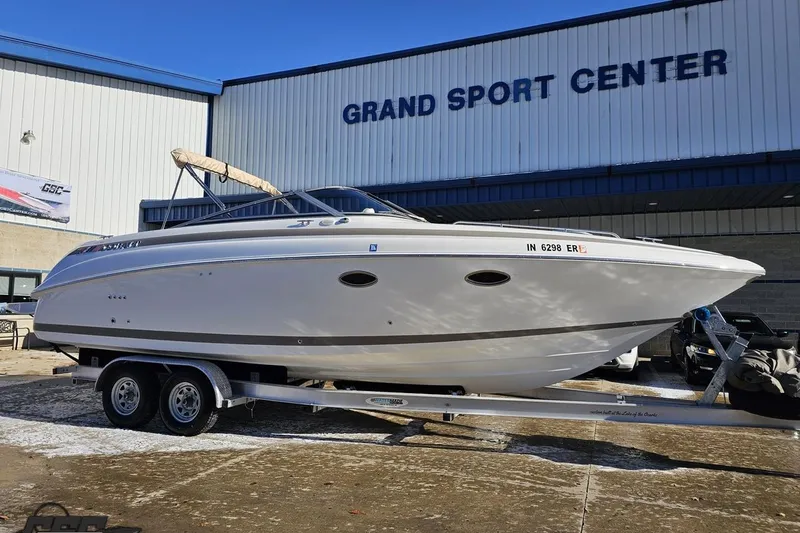 Slide: The Image of 2000 Cobalt 293 boat on trailer at Grand Sport Center. - 11