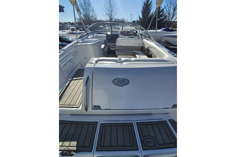 Slide: The Image of 2000 Cobalt 293 boat interior with seating and deck, showcasing luxury design. - 32