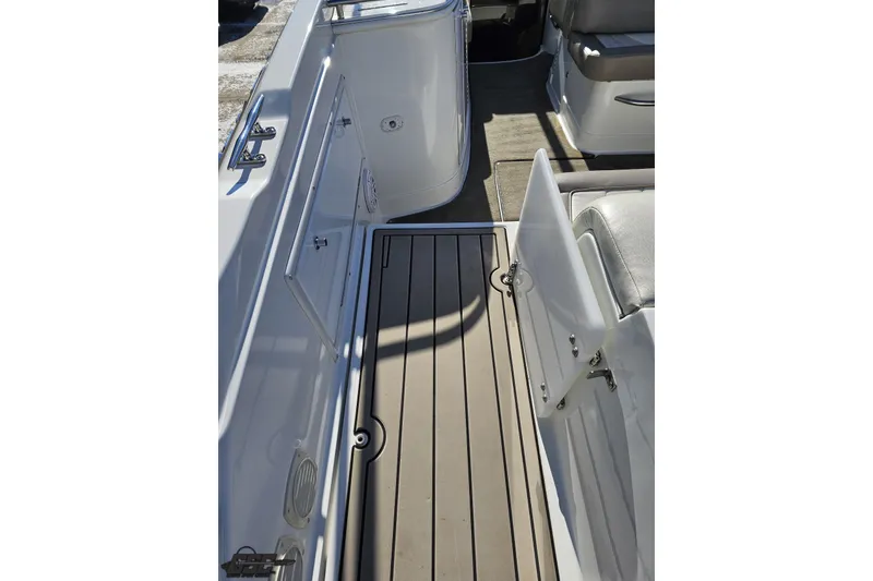 Slide: The Image of Cobalt 293 boat interior, 2000 model, featuring sleek seating and modern flooring. - 43