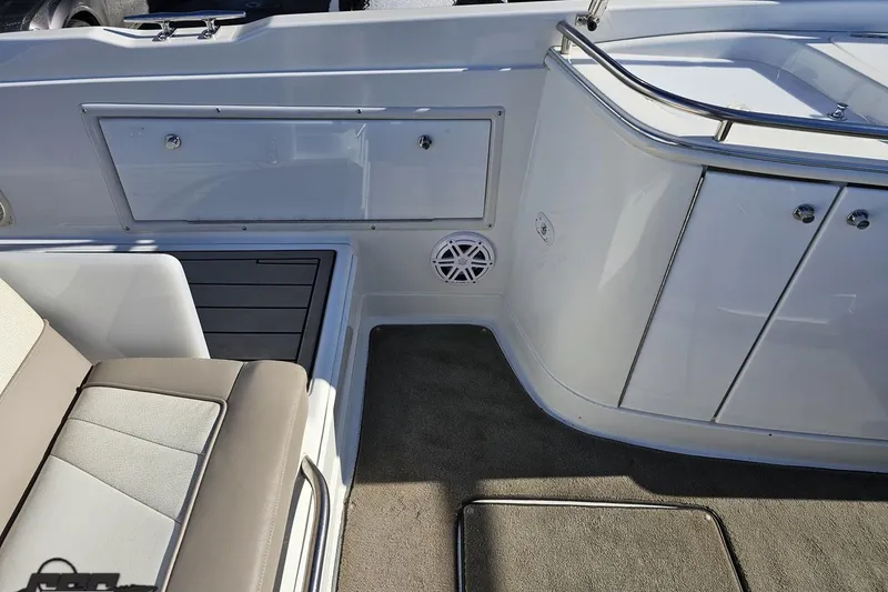 Slide: The Image of Interior of a 2000 Cobalt 293 boat, featuring seating and storage compartments. - 47