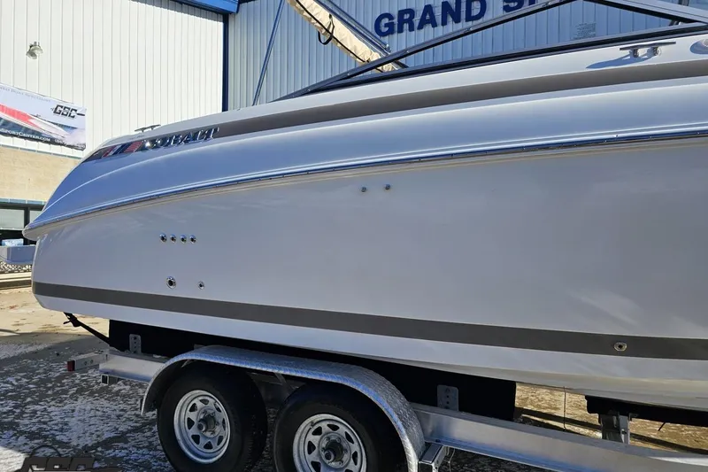 Slide: The Image of 2000 Cobalt 293 boat on trailer outside Grand Sport Center. - 5