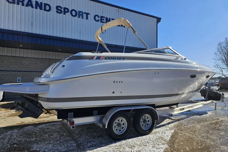 Slide: The Image of 2000 Cobalt 293 boat on trailer outside Grand Sport Center. - 7