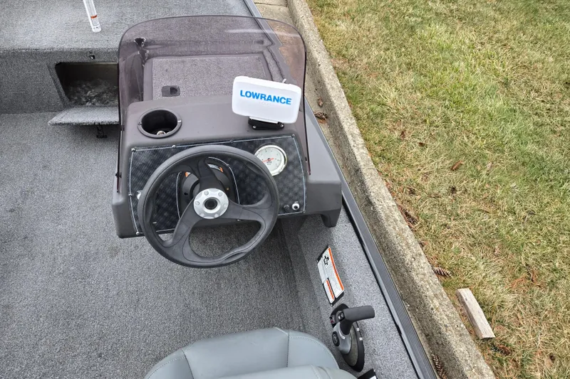 Slide: The Image of 2021 Tracker Bass Tracker Classic XL boat dashboard with Lowrance device. - 12