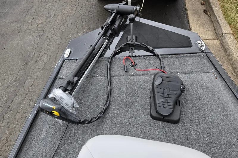 Slide: The Image of 2021 Tracker Bass Tracker Classic XL boat deck with trolling motor and foot pedal. - 16