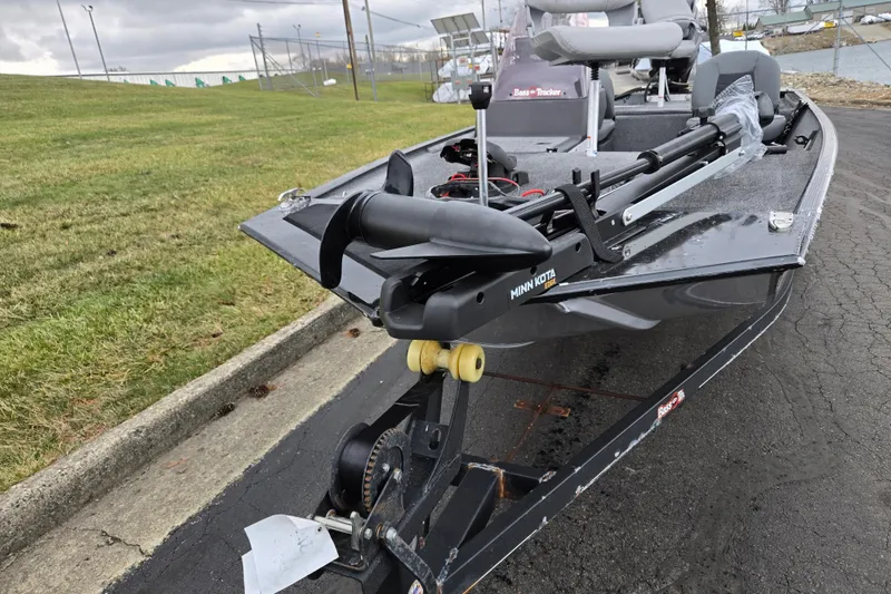 Slide: The Image of 2021 Tracker Bass Tracker Classic XL boat on trailer, featuring Minn Kota trolling motor. - 7