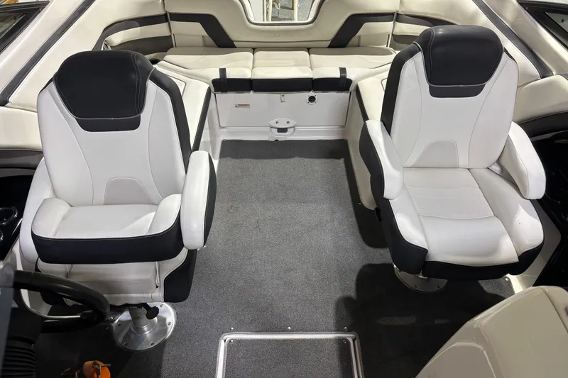 Slide: The Image of Interior of 2016 Yamaha Boats 242 Limited S with dual captain's chairs and rear seating. - 14